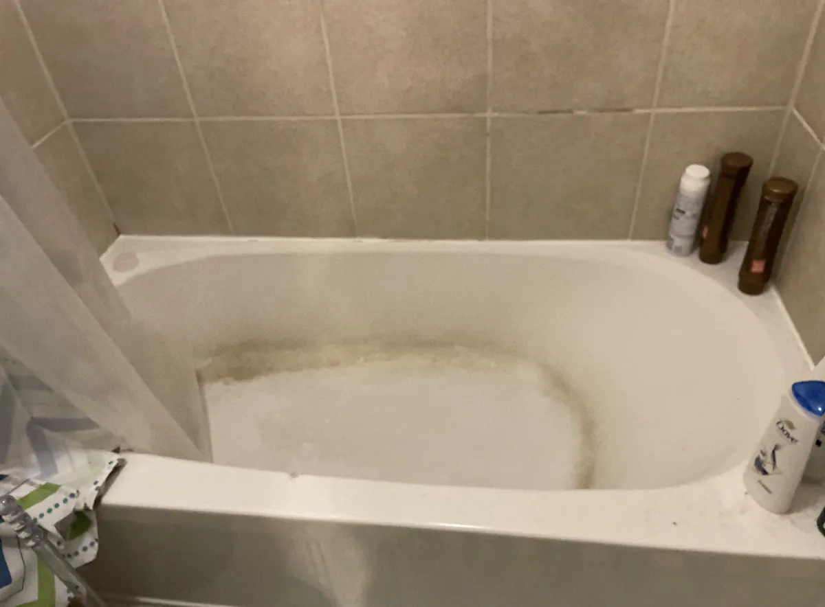 Bathtub before professional cleaning