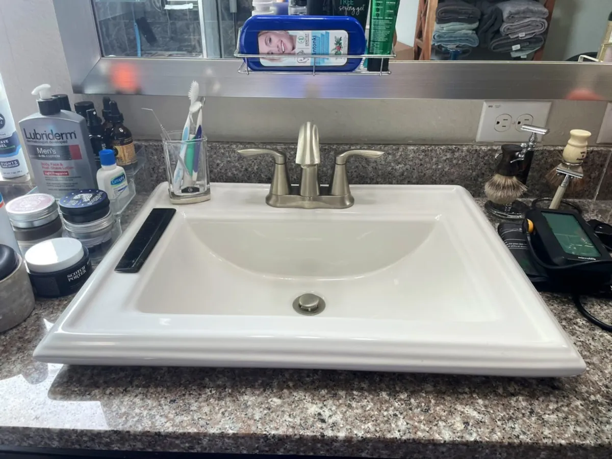 Bathroom sink after Maids of Cy-Fair clean